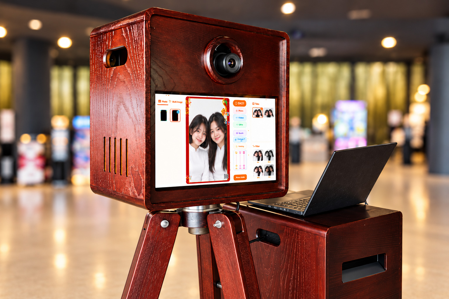 Giao diện phần mềm Photobooth Maytech với hai cô gái mặc áo dài, tùy chọn khung ảnh và bộ lọc